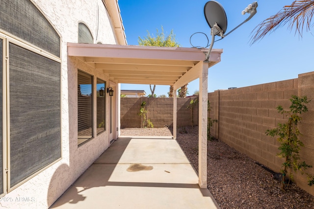 view of patio with a fenced backyard