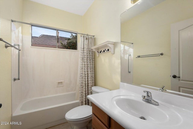 full bathroom featuring shower / tub combo, vanity, and toilet