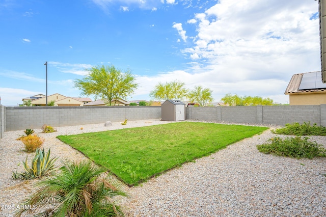 17864 W Paraiso Dr, Surprise, AZ 85387 - view of yard featuring a fenced backyard, an outdoor structure, and a storage unit