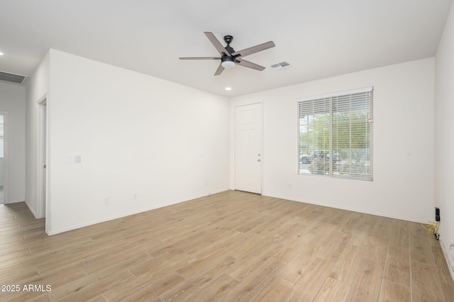 17864 W Paraiso Dr, Surprise, AZ 85387 - empty room featuring recessed lighting, light wood finished floors, visible vents, and ceiling fan