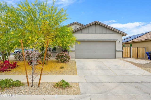 17864 W Paraiso Dr, Surprise, AZ 85387 - view of front facade with driveway, a garage, fence, and stucco siding