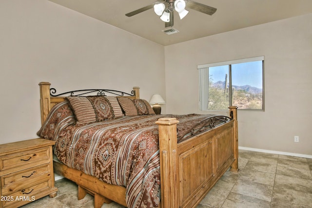 bedroom featuring visible vents, ceiling fan, and baseboards