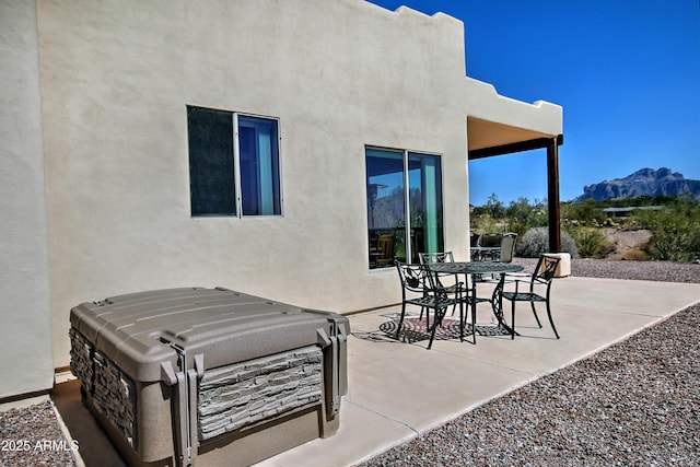 view of patio with a mountain view