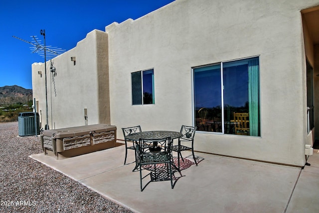 view of patio / terrace featuring central air condition unit