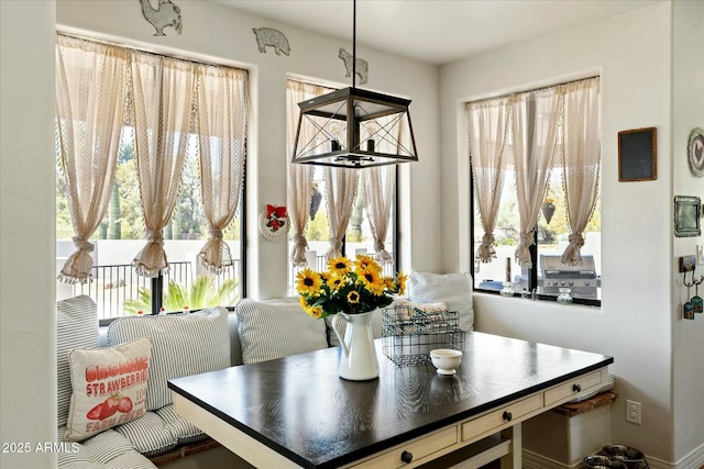 dining space featuring a healthy amount of sunlight and breakfast area