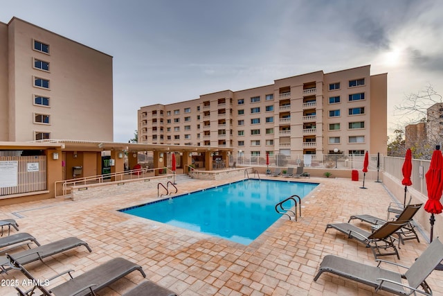 7970 E Camelback Rd Unit 110, Scottsdale, AZ 85251 - pool featuring a patio and fence
