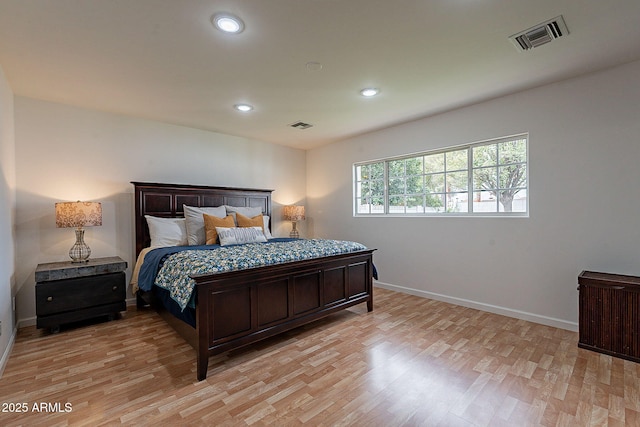 bedroom featuring light wood-type flooring