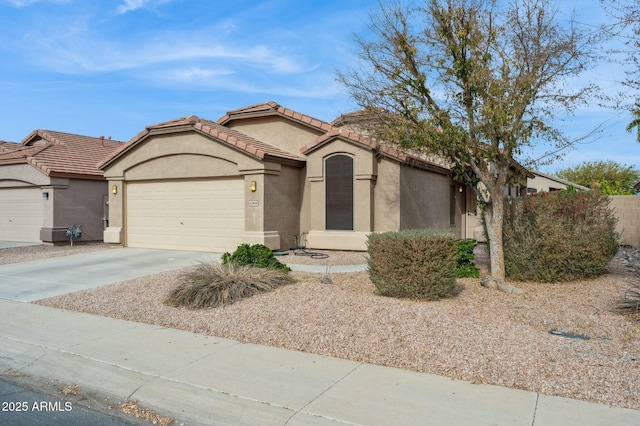 view of front of property with a garage