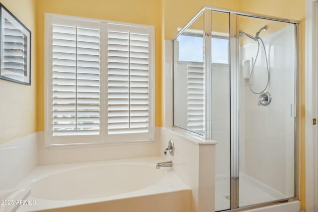 bathroom featuring plus walk in shower