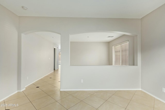 view of tiled spare room