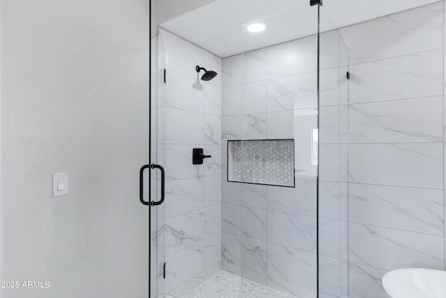 full bathroom featuring a shower stall