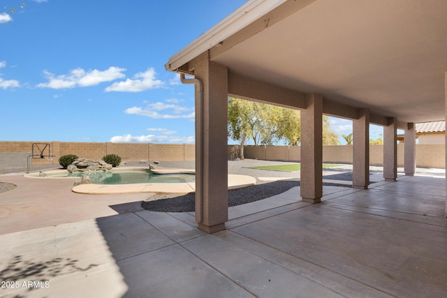 view of patio / terrace featuring a fenced backyard and a fenced in pool