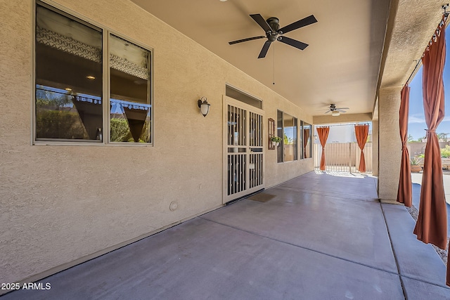 view of patio / terrace featuring a ceiling fan