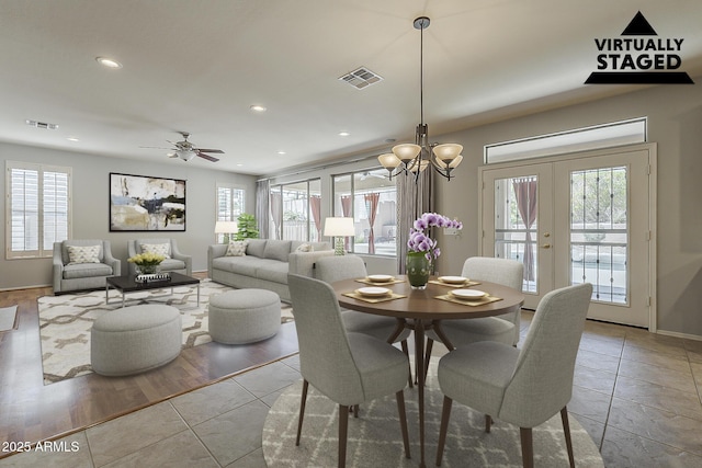 dining room featuring recessed lighting, a healthy amount of sunlight, and visible vents