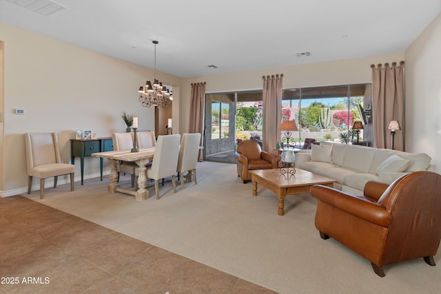 living room featuring light colored carpet and a chandelier