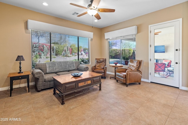 living room featuring ceiling fan