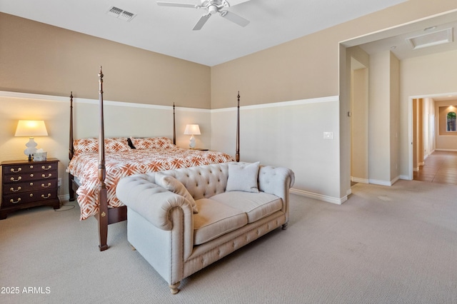 bedroom featuring light carpet and ceiling fan