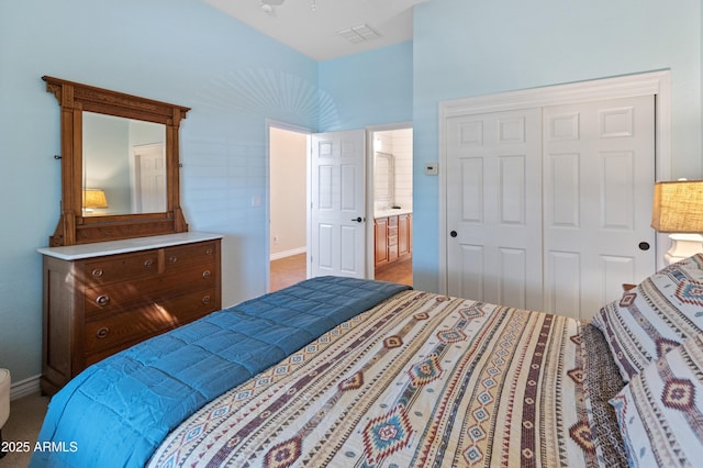 carpeted bedroom with a closet