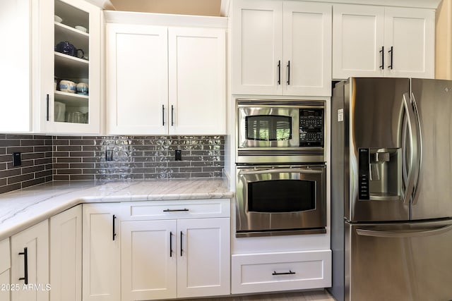 25042 S Hollygreen Dr, Sun Lakes, AZ 85248 - kitchen with white cabinetry, appliances with stainless steel finishes, and glass insert cabinets