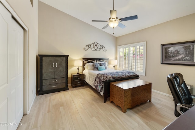 25042 S Hollygreen Dr, Sun Lakes, AZ 85248 - bedroom with light wood-style floors, baseboards, ceiling fan, and lofted ceiling