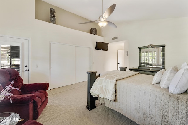 25042 S Hollygreen Dr, Sun Lakes, AZ 85248 - bedroom featuring ceiling fan, carpet floors, high vaulted ceiling, visible vents, and a closet