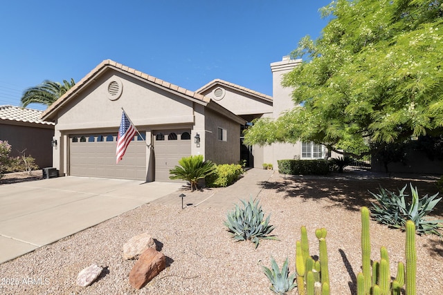 25042 S Hollygreen Dr, Sun Lakes, AZ 85248 - single story home featuring a garage, stucco siding, and driveway