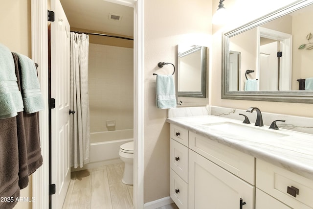 25042 S Hollygreen Dr, Sun Lakes, AZ 85248 - bathroom with toilet, shower / tub combo with curtain, and vanity