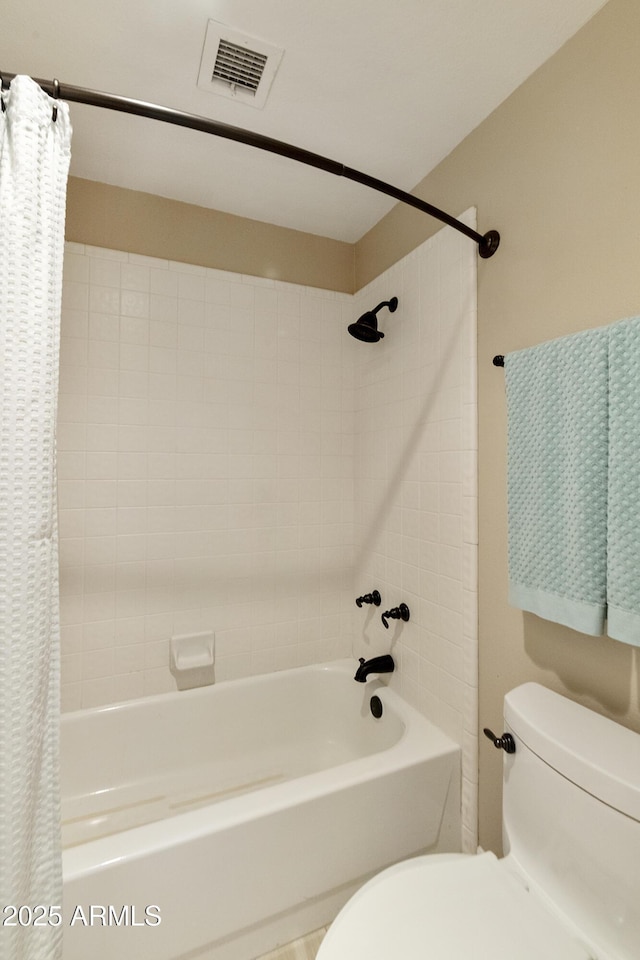 25042 S Hollygreen Dr, Sun Lakes, AZ 85248 - bathroom featuring visible vents, shower / tub combo, and toilet