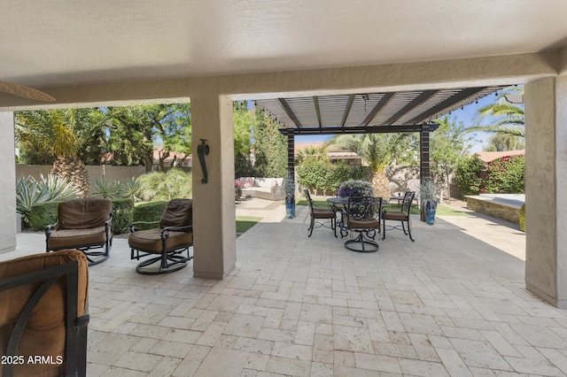 25042 S Hollygreen Dr, Sun Lakes, AZ 85248 - view of patio with a fenced backyard, a pergola, and outdoor dining space