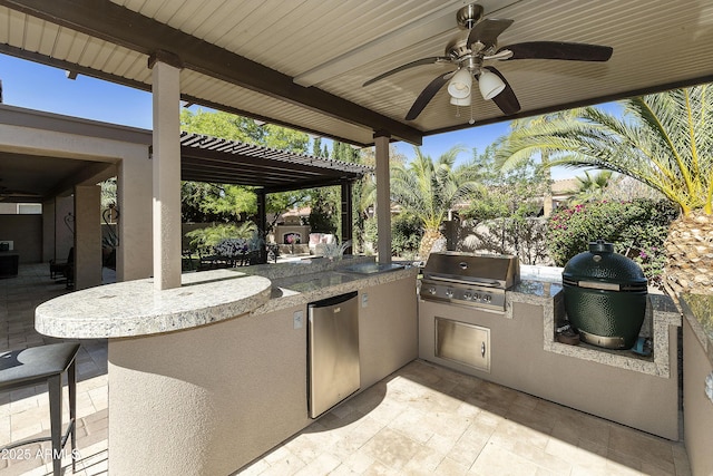 25042 S Hollygreen Dr, Sun Lakes, AZ 85248 - view of patio with an outdoor kitchen, a ceiling fan, and area for grilling