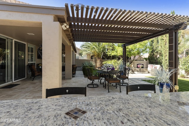 25042 S Hollygreen Dr, Sun Lakes, AZ 85248 - view of patio featuring fence, an outdoor fireplace, a pergola, and outdoor dining space
