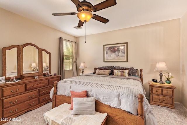 bedroom with light colored carpet and ceiling fan