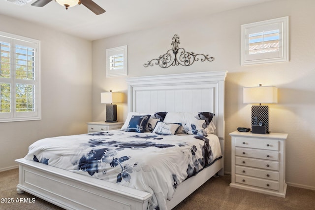 bedroom featuring a ceiling fan, carpet, visible vents, and baseboards