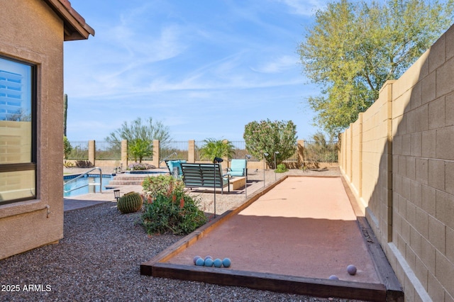 view of patio / terrace featuring a fenced backyard and a fenced in pool