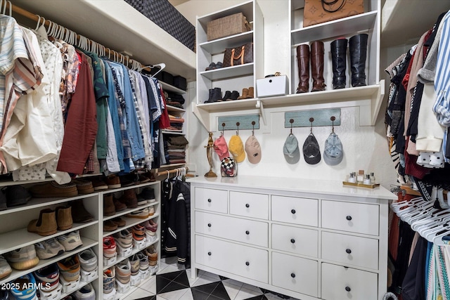 spacious closet with tile patterned floors