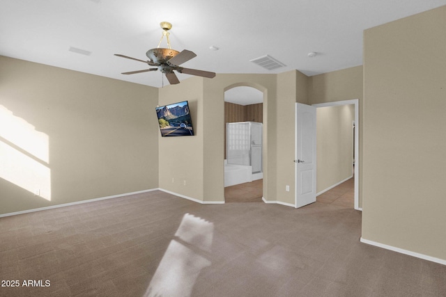 carpeted empty room with ceiling fan