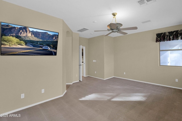 carpeted empty room with ceiling fan