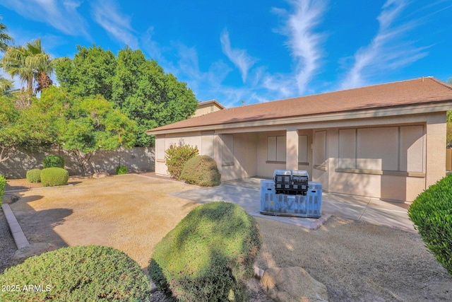 view of front of property featuring a patio