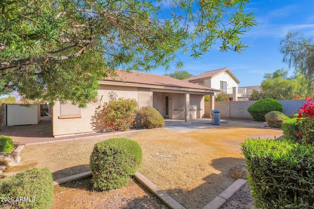 view of front of property with a patio