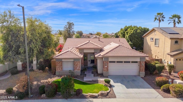 front of property with a garage