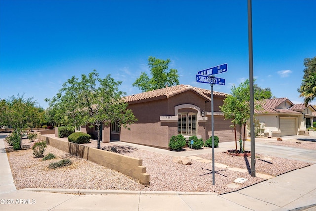 4976 S Sugarberry Ln, Gilbert, AZ 85298 - view of front facade featuring stucco siding, concrete driveway, a tiled roof, and a garage