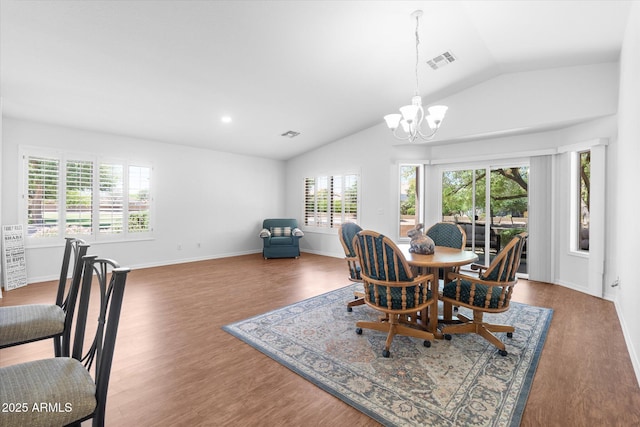 4976 S Sugarberry Ln, Gilbert, AZ 85298 - dining room featuring lofted ceiling, a chandelier, wood finished floors, and baseboards