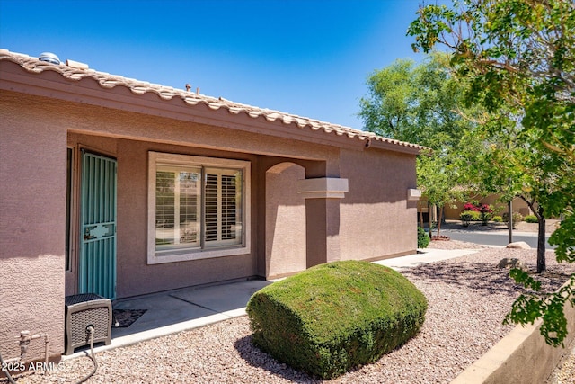 4976 S Sugarberry Ln, Gilbert, AZ 85298 - doorway to property featuring stucco siding and a patio area