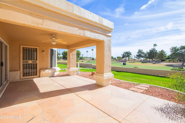 view of patio / terrace featuring ceiling fan