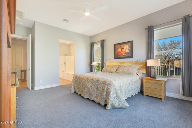 carpeted bedroom featuring multiple windows and ceiling fan