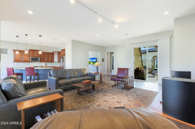 living room featuring rail lighting