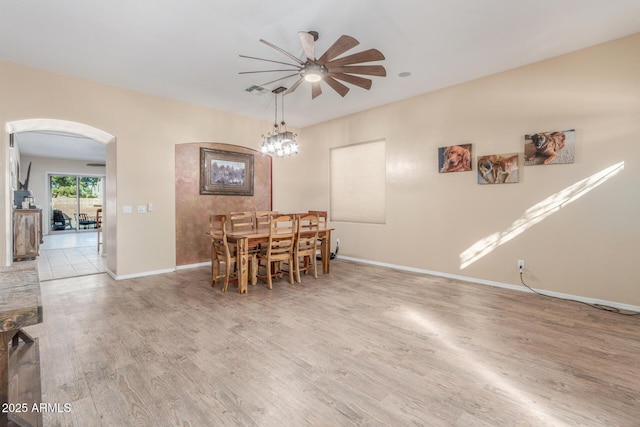 dining room featuring ceiling fan and light hardwood / wood-style flooring