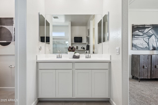 1584 S 241st Ave, Buckeye, AZ 85326 - bathroom featuring double vanity and ornamental molding