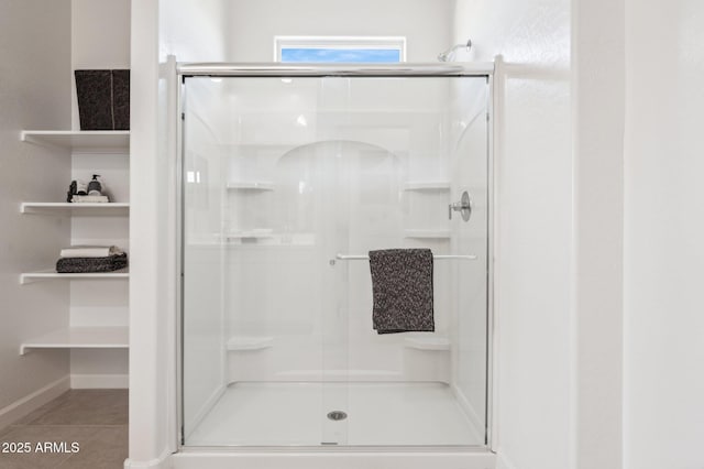 1584 S 241st Ave, Buckeye, AZ 85326 - bathroom featuring a shower stall and tile patterned floors