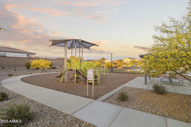 1584 S 241st Ave, Buckeye, AZ 85326 - playground at dusk featuring a playground